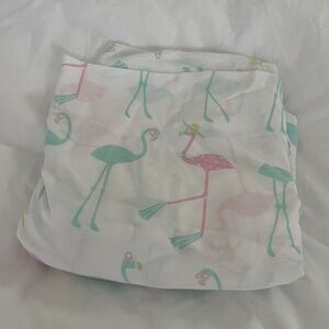 Discontinued pattern PB Kids teal and pink flamingo crib sheet.